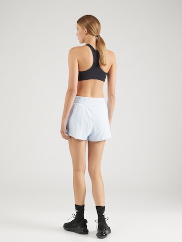 Regular Pantaloni sport 'ONE' de la NIKE pe albastru