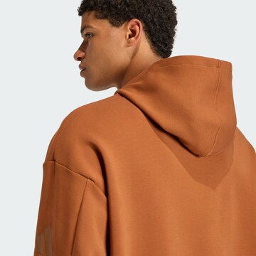 ADIDAS SPORTSWEAR - Camiseta deportiva 'Soft Lux' en marrón