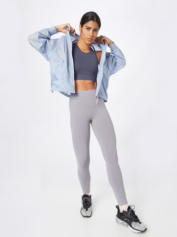 Skinny Pantalon de sport SKECHERS en gris