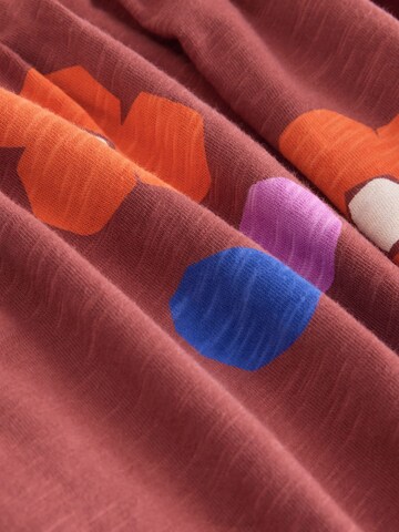 Rochie de la Next pe portocaliu