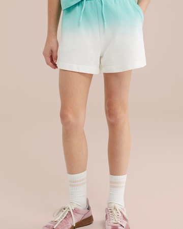 Largi Pantaloni de la WE Fashion pe verde: față