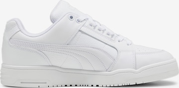 Baskets basses PUMA en blanc