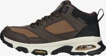 SKECHERS Boots in Brown