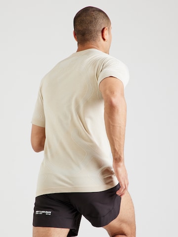 Tricou funcțional 'ROAD' de la ASICS pe alb