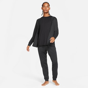 Effilé Pantalon de sport NIKE en noir