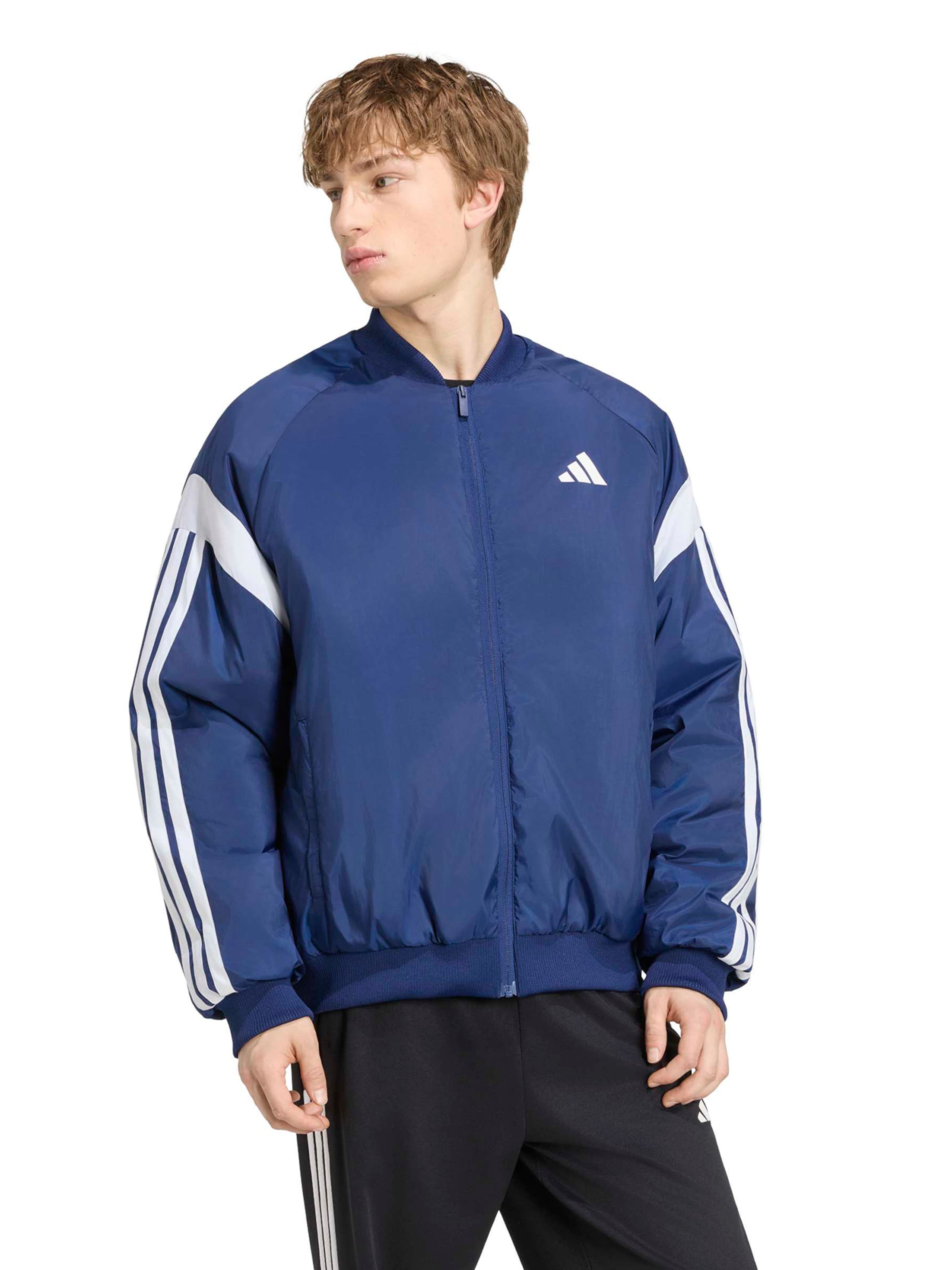 ADIDAS SPORTSWEAR - Chaqueta deportiva 'TIRO' en azul: frente