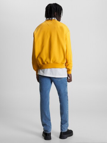 Sweat-shirt Tommy Jeans en jaune