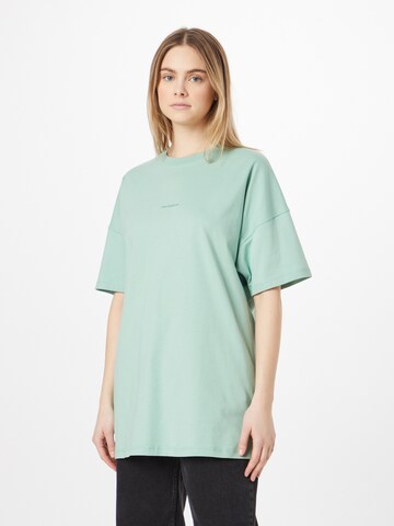 Maglia extra large di new balance in verde: frontale