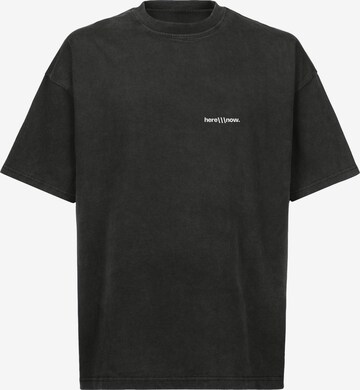 here\
ow. Shirt 'Unison' in Black: front