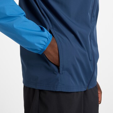 Veste de sport new balance en bleu