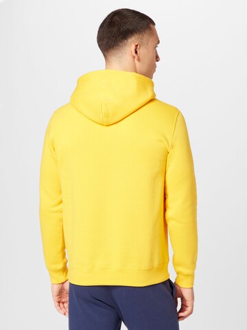 Champion Authentic Athletic Apparel - Sweatshirt em amarelo