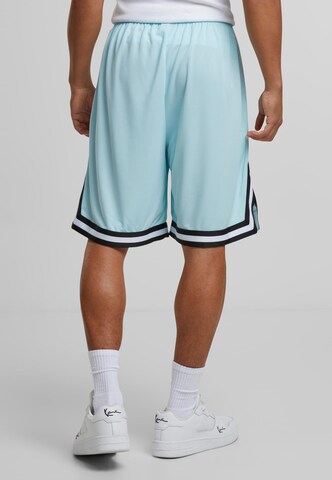Karl Kani Loose fit Pants in Blue