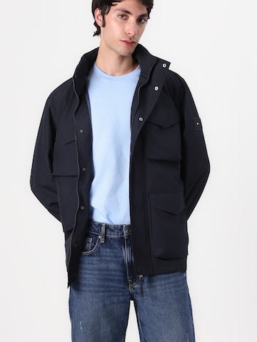 TOMMY HILFIGER Välikausitakki värissä sininen