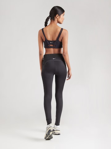 juoda NIKE Siauras Sportinės kelnės 'SWIFT TFADV'