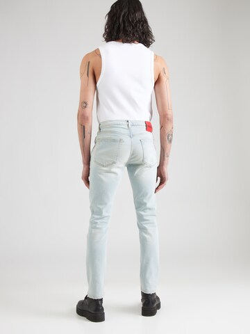 Skinny Jeans di HUGO in blu