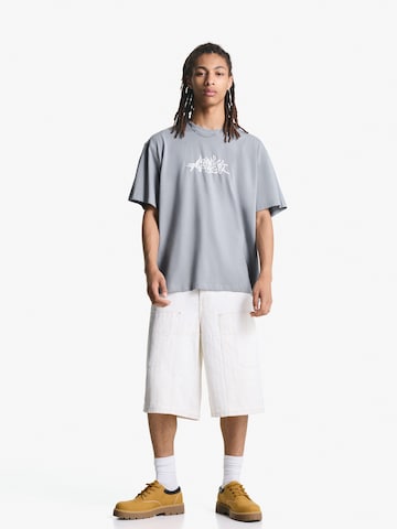 Maglietta di Bershka in grigio
