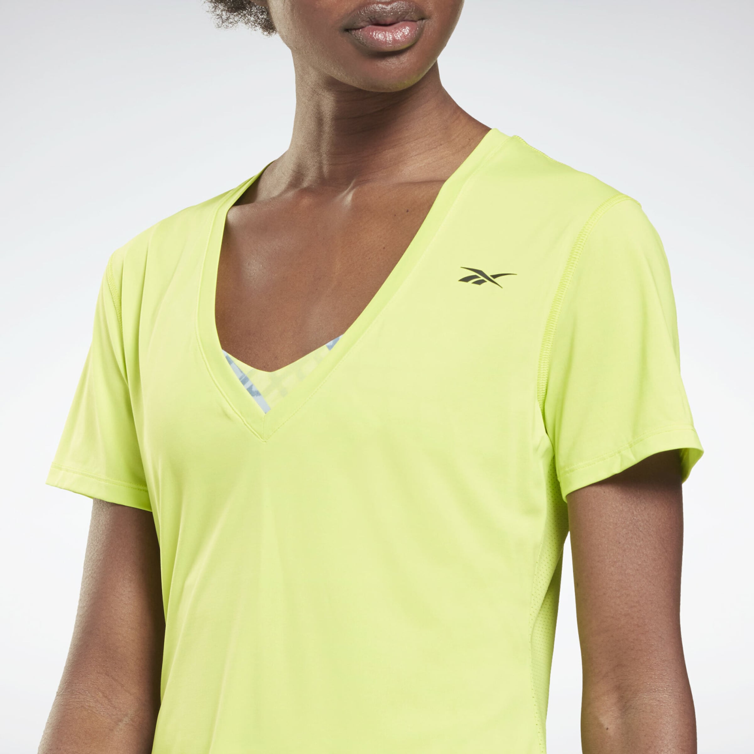 Femme T-shirt fonctionnel Reebok Sport en Jaune Fluo 