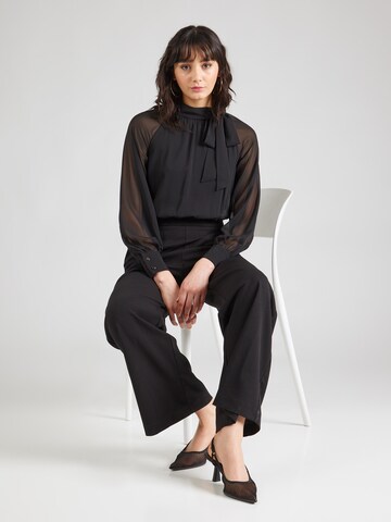 Tuta jumpsuit di SWING in nero