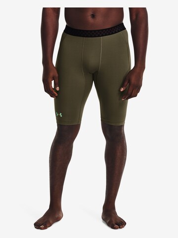 UNDER ARMOUR Skinny Workout Pants 'Rush' in Green: front