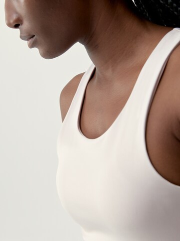 Born Living Yoga Sports top 'Smash' in Pink