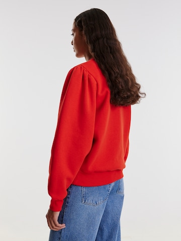 EDITED Sweatshirt 'Tamy' in Rot