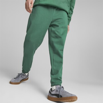 PUMA Tapered Pants in Green: front