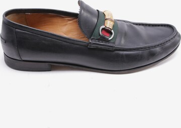 Gucci Flats & Loafers in 45 in Black: front