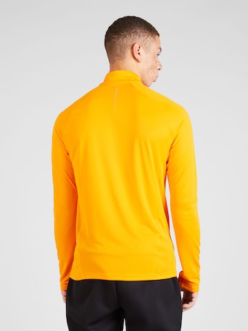 ODLO Λειτουργικό μπλουζάκι 'Essential Ceramiwarm' σε πορτοκαλί