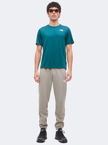 Tricou funcțional de la THE NORTH FACE pe albastru