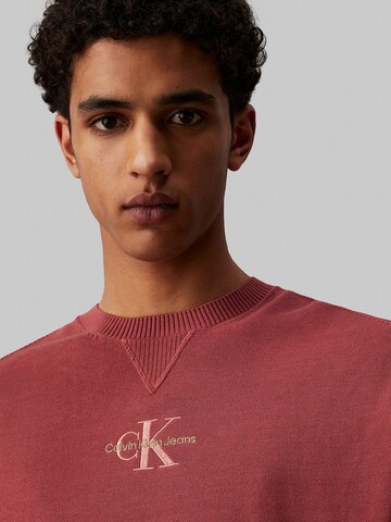 Pull-over Calvin Klein Jeans en rouge