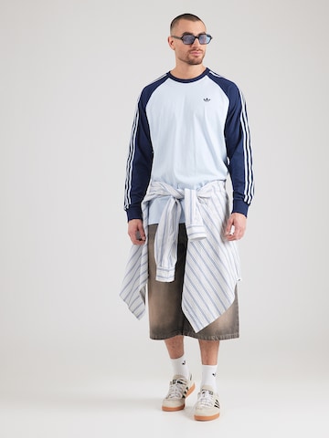 ADIDAS ORIGINALS Koszulka 'CALI' w kolorze niebieski