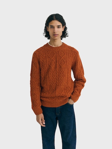 Thinking MU Neulepaita 'Rasta' värissä oranssi: etupuoli