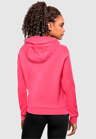 Sweat-shirt 'Love Yourself First' Merchcode en rose