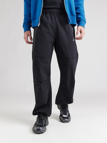 Nike Sportswear Ohlapna forma Funkcionalne hlače 'Tech' | črna barva: sprednja stran