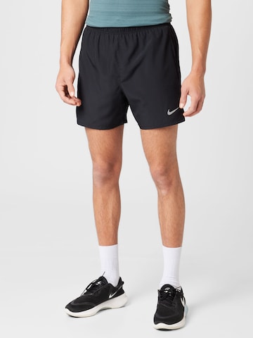 NIKE Обычный Спортивные штаны в Черный: спереди