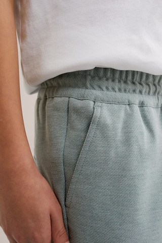 WE Fashion - Regular Calças em verde