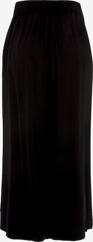 LASCANA - Perna larga Calças com vincos em preto: frente