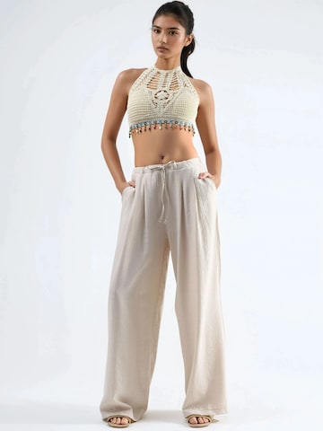 Wide leg Pantaloni con pieghe di Busem in beige