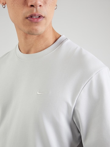 NIKE Funktionsskjorte 'PRIMARY' i grå