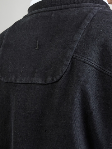 Nike Sportswear T-Shirt 'ESC FORTE' in Schwarz