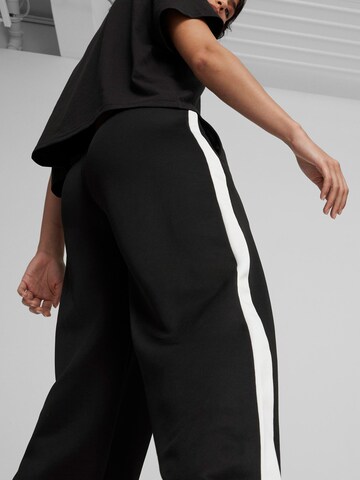 Largi Pantaloni 'T7' de la PUMA pe negru