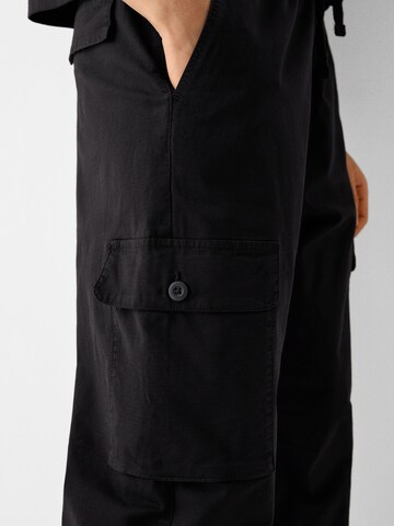 Bershka Loose fit Cargo Pants in Black