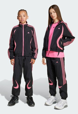 Tapered Pantaloni 'Teamgeist' di ADIDAS ORIGINALS in nero: frontale