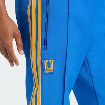 Effilé Pantalon de sport 'Tigres UANL Terrace Icons' ADIDAS ORIGINALS en bleu