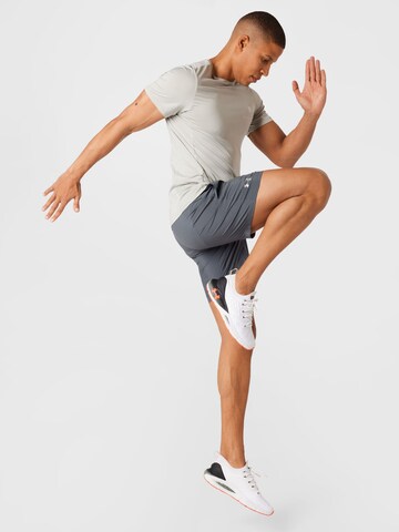 UNDER ARMOUR Regular Sportshorts 'Speed Stride 7' in Grau