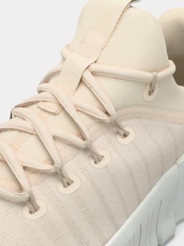 Scarpa sportiva 'FREE METCON 6' di NIKE in bianco