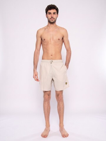 Lyle & Scott Board Shorts in Beige: front