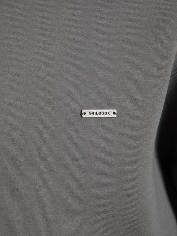 Veste de survêtement Smilodox en gris