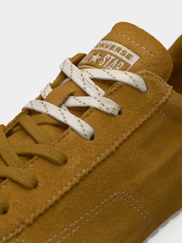 Baskets basses CONVERSE en jaune