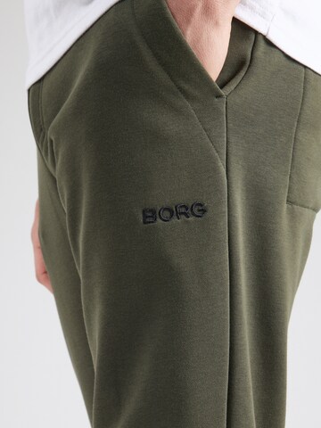 BJÖRN BORG Конический (Tapered) Спортивные штаны 'ESSENTIAL 4' в Зеленый